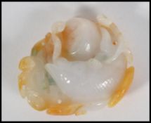 A Chinese intricately carved jade roundel of circu