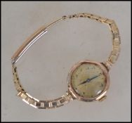 A 9ct gold early 20th century ladies dress / cockt