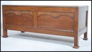 A vintage mid 20th century oak panel blanket box,