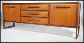 A superb Danish style teak sideboard in the manner