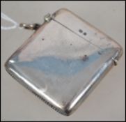 A silver hallmarked match vesta of simple form wit