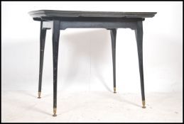 A 1950's / mid century retro draw leaf dining tabl
