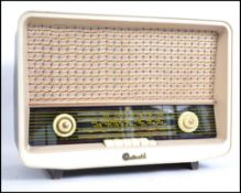 A vintage mid 20th century wooden cased Pye Contin