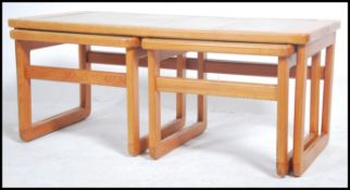 A set of retro Danish tilled top nest of three tab