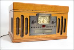A Crosley vintage style wooden cased record player