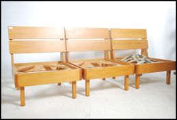 A set of retro 1970's modular wooden panel seats.