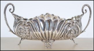 A silver hallmarked twin handled bowl bearing make