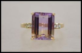 A ladies 18ct yellow gold amertrine and diamond dr