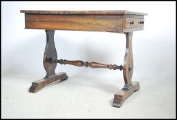 A 19th century Regency rosewood writing table desk