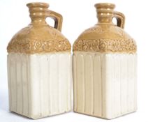 A pair of 19th century stoneware spirit flask deca