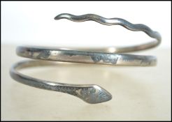 A Siam silver slave bangle in the form of a snake