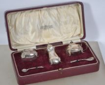 A silver hallmarked 5 piece cased condiment set by