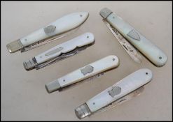 A collection of five silver hallmarked fruit / fol