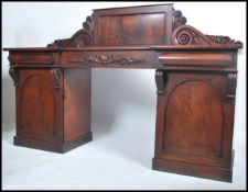 A Regency flame mahogany twin pedestal large sideb