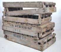 A stack of vintage Industrial apple crates. Wooden