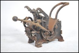 An early 20th century cast iron table / bench top