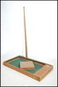 A mid century solid oak table top bar skittles gam
