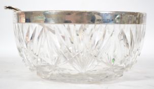 A silver hallmarked cut glass salad bowl and spoon