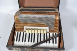 A vintage 20th century cased Musical instrument -