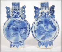 A pair of Chinese blue and white porcelain moon fl