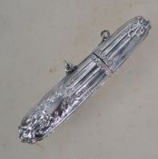 A decorative rococo silver needlecase of cylindric