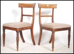 A pair of Regency mahogany bar back dining chairs