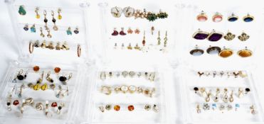 A large collection of costume jewellery earrings t