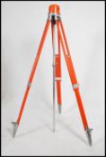 A vintage 20th century industrial orange painted w