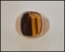 A 9ct gold hallmarked tigers eye agate set gentlem