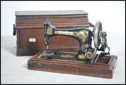 A vintage Singer Sewing machine  having hand crank