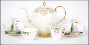 A pretty hand painted Art Deco coffee service by G