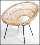 A 1950's metal and bamboo ' tropics ' chair. Raise