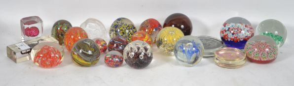 A collection of retro 20th century glass paperweig