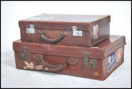 A collection of vintage 20th century suitcases of