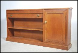 A 20th century Arts & Crafts revival solid oak ope