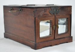 A Chinese huanghuali and brass mounted toilet box,