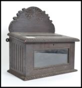 A 19th century / 20th century carved oak hotel pos