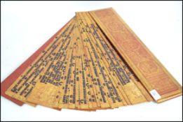 A  fabulous rare palm leaf style wooden prayer boo