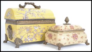 A pair of stunning ceramic lidded dishes the large