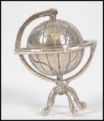 A small silver / white metal marked 800 terrestria