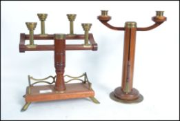 Two unusual home made turned wooden and brass cand