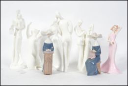 A collection of Royal Doulton figurines to include
