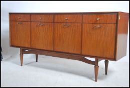 A good 1970's teak wood sideboard raised on a turn