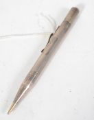 A sterling silver propelling pencil, having an eng