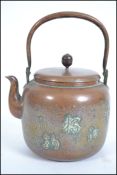 An unusual Chinese copper teapot with chased decor