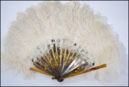 A ladies early 20th century Tortoiseshell ostrich