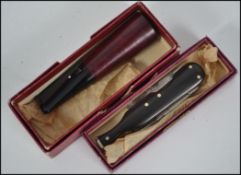 Vintage 20th century boxed Dunhill cigar holder an