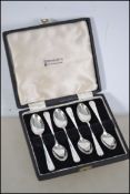 A cased set of silver hallmarked spoons by Cooper