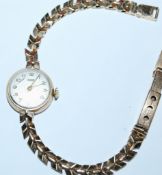 A vintage hallmarked 9ct gold Tissot Ladies cockta