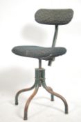 A vintage mid century Industrial swivel chair rais